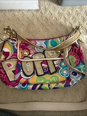 Coach poppy bag Colorful Gold-Accent Tote Bag with Bold Graphic Design